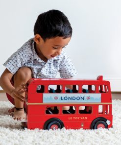 TV469-London-Bus-Boy-Pushing-Red-Vehicle
